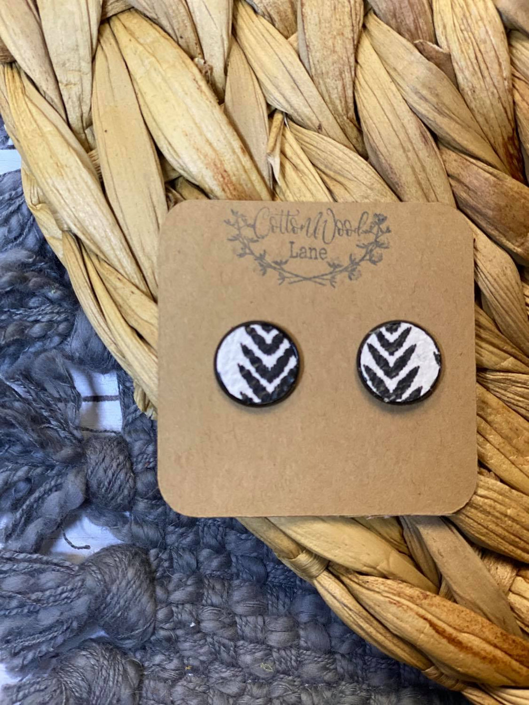 White and black chevron studs